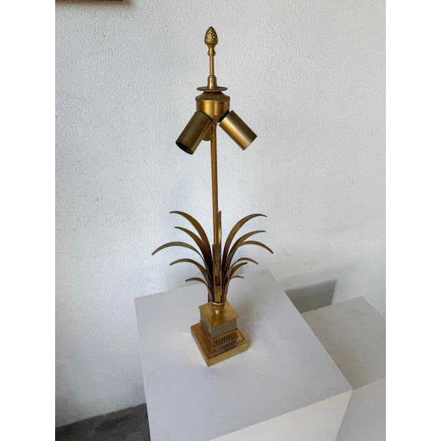 Old “epi” model table lamp by the publisher “Boulanger”, in the style of Maison Charles. with its square base into which...