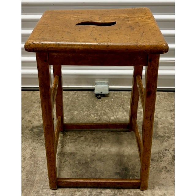 English 19th century pine stool with side stretchers and rustic character. This is a piece with charm and practicality...
