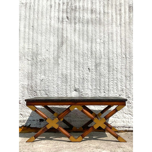 Add a touch of bohemian sophistication to your living space with this Vintage Boho John Richards Campaign Coffee Table....