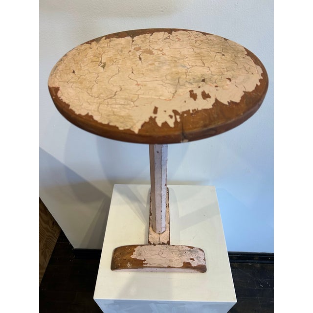 Wear commensurate with age featuring distressed and crackled paint