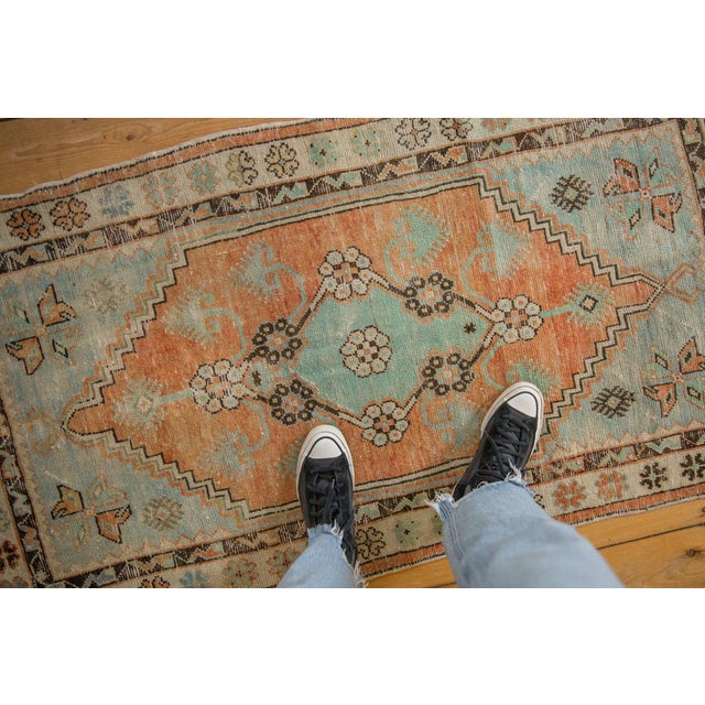 :: Center medallion with floral top views with long stemmed scrolled blossoms in finned relief. Inner minor border in a...