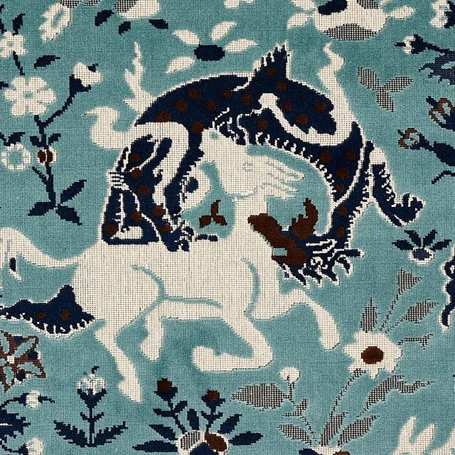 Fantastical creatures taken from a 16th-century rug roam across a landscape of colossal flowers. The varying heights of...