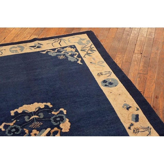 Antique Chinese - Peking Blue 1900s Rug, Circa Date: 1900s. This exceptional Chinese carpet captures the restrained...