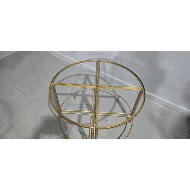 A very good quality French Art Deco gilt metal nest of four tables making a circular table, in overall very good...