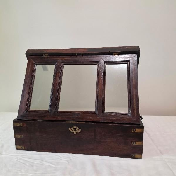 This exceptional 19th-century Victorian Anglo-Indian military campaign vanity dressing box is crafted from highly figured...