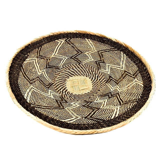 Tonga Binga baskets are traditional handcrafted baskets made by the Tonga women of Binga district in Zimbabwe. Crafted...