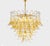 This extraordinary chandelier, designed and produced by Mazzega, is a true expression of 1970s Italian design. The gold-...