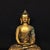 This exquisite vintage sculpture depicts Shakyamuni Buddha seated in deep meditation upon an ornate double-lotus base....