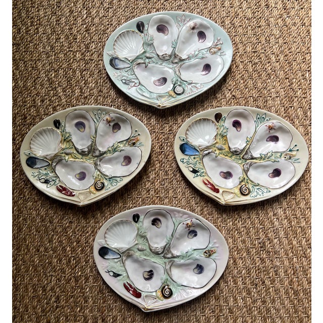 Hand painted oyster plate made in the United States by Union Porcelain Works in the late 19th century. Decorated with sea...