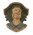 Carved Wood Figural Wall Shelf. Wall shelf features a carved and painted mascaron-like human male face with expressive...
