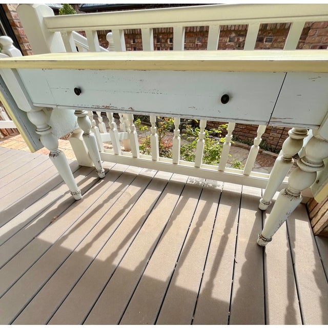 This charming buffet or console table is a drop leaf. It has two sections on each end that are 15” each, which adds 30”...