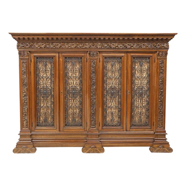 Antique Bookcase,Italian Renaissance Revival, Carved Walnut, Iron Doors, C. 1900 For Sale