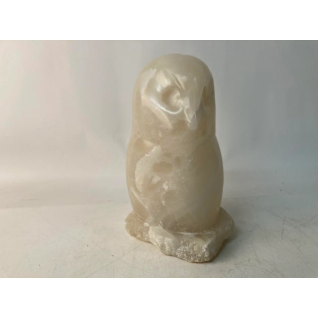 A Vintage Perching Owl Sculpture with a serene and mysterious presentation. Well sculpted in a Stylized manner with an...