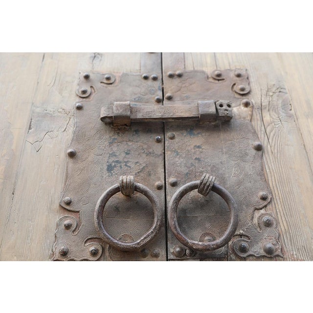 Antique Chinese Pine Compound Gate of substantial proportions, being 8H x 5.5w, with decorative iron trim on the top and...