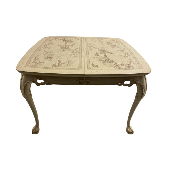 A rare form oval dining table from the Ming Treasures line by Drexel Heritage. Lacquered in off-white and incised with a...