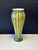 This is a blown glass, hand-shaped piece of art. The exterior is finished in embossed glass in a combination of shades of...