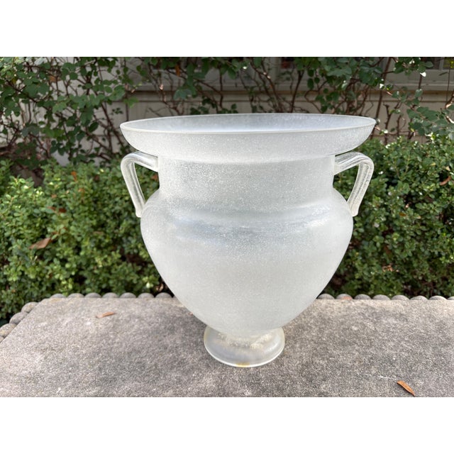 Murano Glass Urn Signed Seguso. Offered is a large blown Murano glass urn with stylized handles signed Seguso. This urn or...