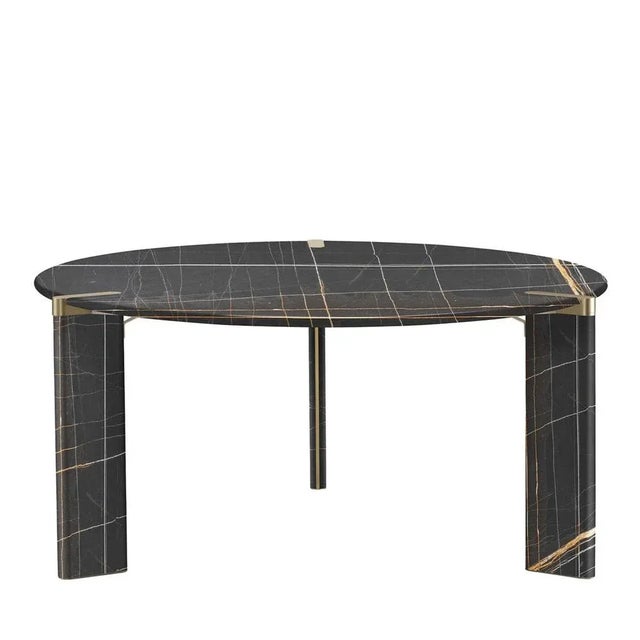 A tripod base consisting of flattened, board-like legs immediately speaks to the modern allure of this dining table,...