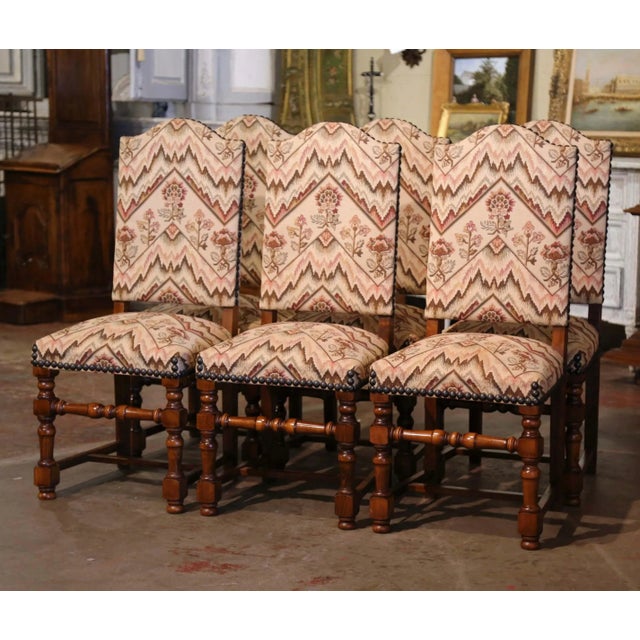 This set of six French dining chairs brings immediate warmth and texture to a room, combining classic Louis XIII form with...