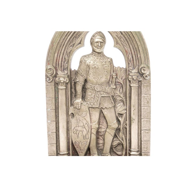 A fantastic pair of antique Gorham Co. "The Travelers Convention" bookends silvered bronze bookends depicting knights in...