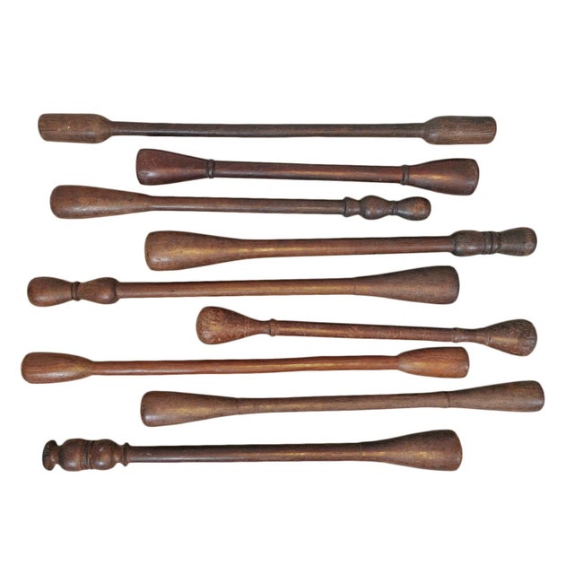 Antique hand carved hard wood pestle from West Africa. A basic kitchen necessity for African homes to pound maize, grain,...