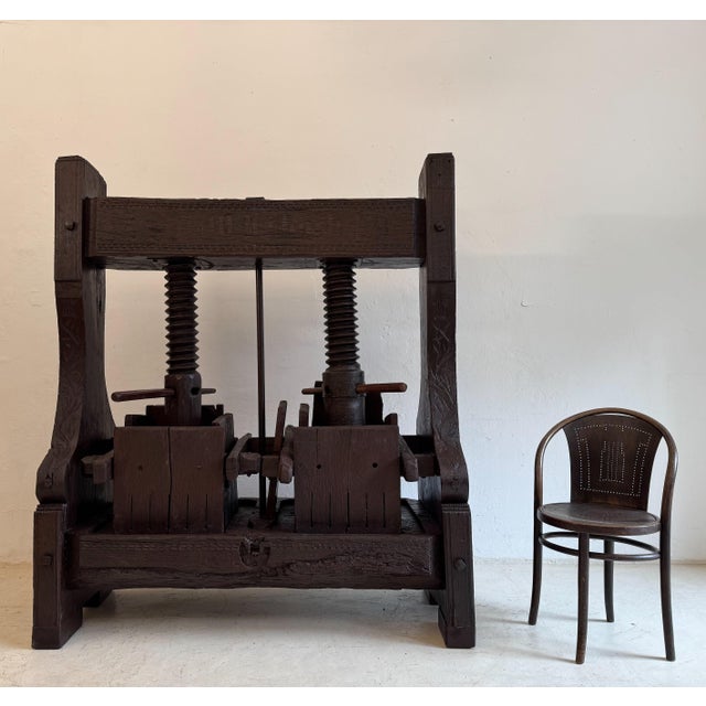 Large antique wine press or grape press made of solid oak. Probably dating from the 19th century. An extremely decorative...