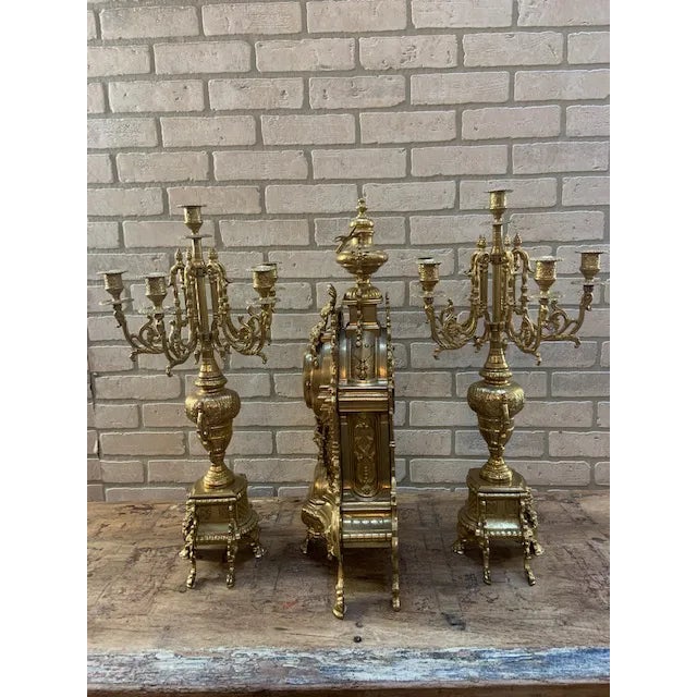 Antique French Rococo Revival Bronze Garniture Clock Set with Candelabras, 3-Piece Antique French three-piece garniture...