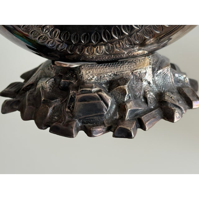 This Victorian silver plated spoon warmer is beautifully crafted in the shape of a nautilus shell, a popular design during...