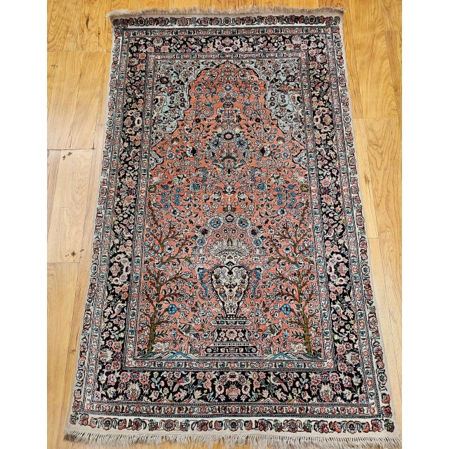 This exquisite all-silk Turkish Hereke pictorial rug — woven in the early 20th century — beautifully showcases the...