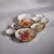 Kenneth Ludwig Chicago Cluster of Nine Round Serving Bowls- Gold w/ White Enamel