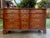 Elegant mahogany triple dresser by premium American furniture manufacturer, Kindel Grand Rapids. This richly figured...