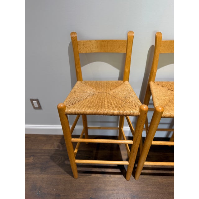 Mid-Century Modern 1970s Set of 3 Danish Modern Style Oak Counter Stools With Rush Seats For Sale - Image 3 of 15