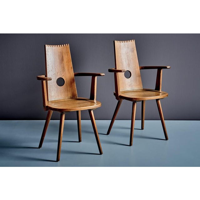 A vintage pair of solid oak armchairs by Vervoort, Tilburg, in good condition with a light age-related patina. Featuring a...