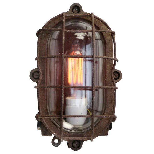 Industrial Sconce in Rust Cast Iron and Clear Glass For Sale - Image 3 of 5