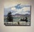 This artwork depicts a sweeping view of the Colorado landscape, featuring the rugged peaks of Mt. Evans and Bierstadt...