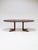 Rare oval extendable dining table manufactured by dyrlund in denmark during the 1960s. This beautiful table is crafted...