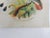 Small antique 1890's color lithograph on card stock of parrots. Unframed, note on back indicates that this was an award to...
