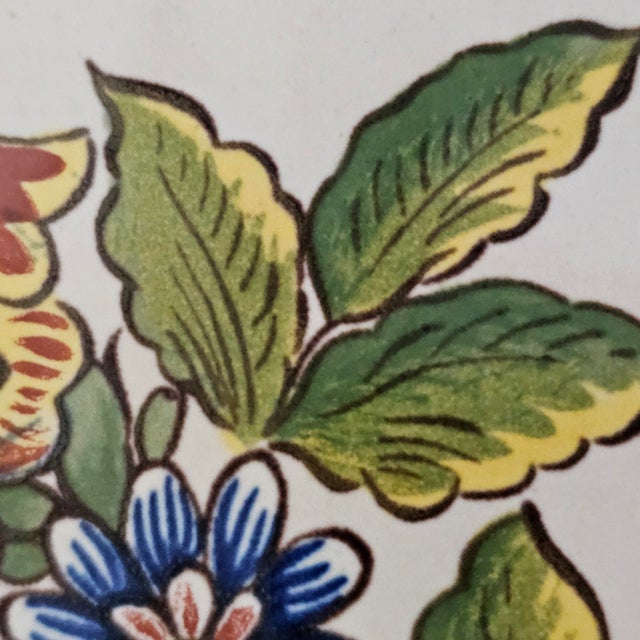 A vivid tableau of French artistry, this faience plate embodies the pastoral grace of early 20th-century design. Crafted...