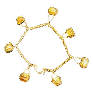24 Karat Yellow Pure Gold 15.5 Gm Charm Bracelet with 7 Basket Charms For Sale