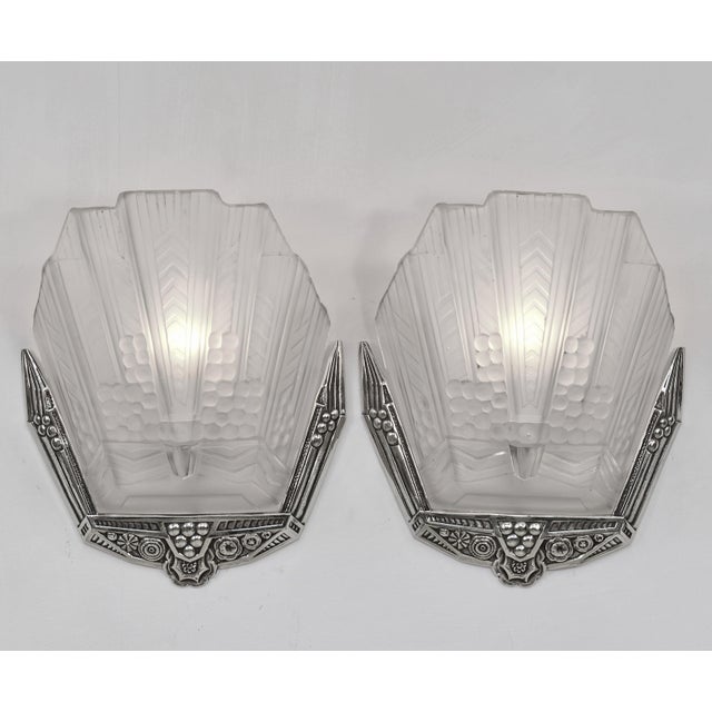 wall sconces by Jean Gauthier A nice pair of authentic 1925-1930 French art deco wall sconces in nickel plated solid brass...