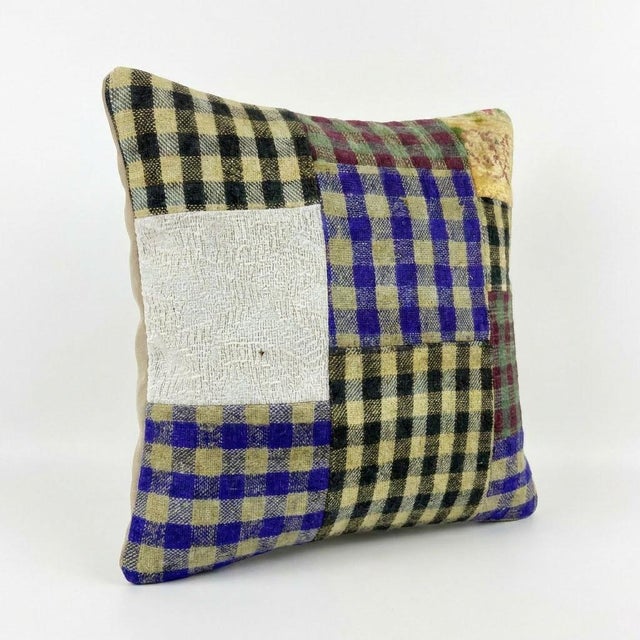 This beautiful 20'' X 20'' pillow cover was made from an authentic Turkish Kilim. Bright colors of wool adorn the front of...