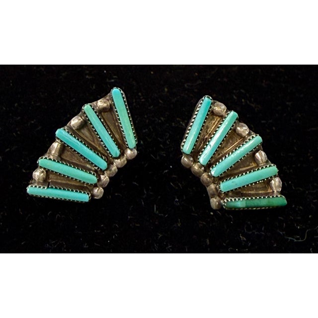 Vintage Zuni needlepoint turquoise and sterling silver earrings in fan style. For pierced ears. Earring backs are also...