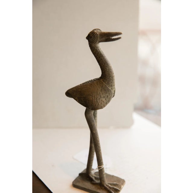:: Vintage handmade African bird sculpture. Circa late mid 20th century, though possibly older, this piece has such...