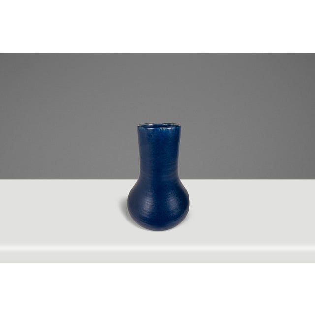Introducing a splendid studio craft rough ceramic flower vase crafted from a ceramic base with an alluring rough, powder...