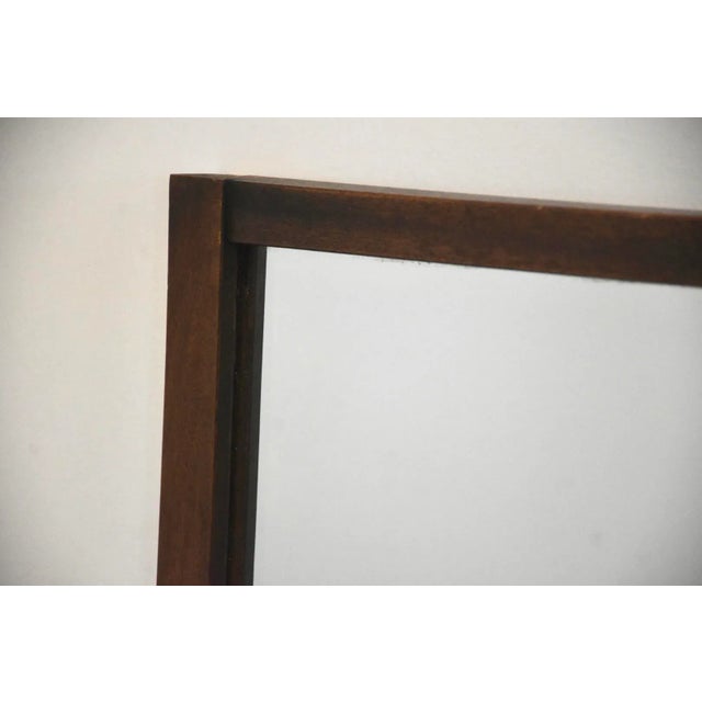 A mid century modern walnut mirror by Broyhill Brasilia