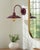 Illuminate your space with the rugged charm of the Pavona wall sconce lighting, where industrial meets rustic in a...