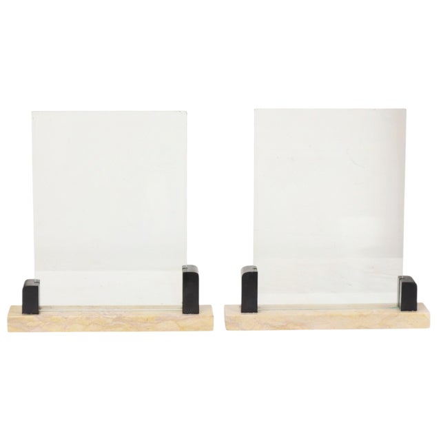 An elegant and stylish set of two Art Deco photo frames crafted from beige and black marble, featuring two panes of...