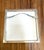 Shell themed framed wall art featuring four distinct sea shell illustrations in a minimalist silver-toned square frame...