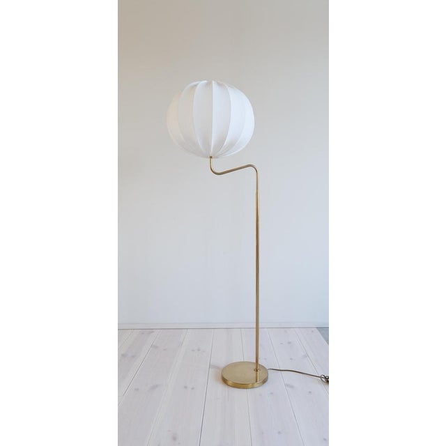 Wonderfully designed floor lamp from Bergboms Sweden. Made in brass and cast iron. Made in the 1960-70 s this not so...