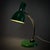A small functionalist table lamp, model 2574, produced by the renowned Swedish manufacturer Bröderna Malmströms...